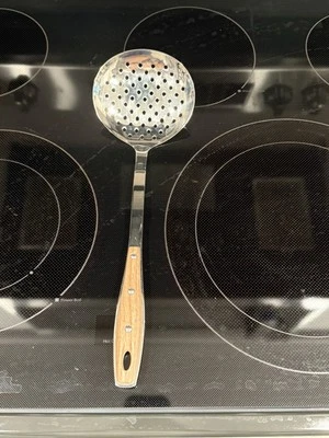 Ложка с прорезями из нержавеющей стали с синтетической ручкой Brandani - Изображение 1 из 4