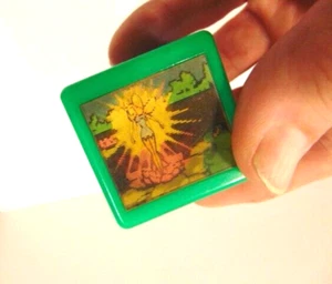 old flicker or hologram type toy block with fairy or pixie emerging from lotus - Picture 1 of 6