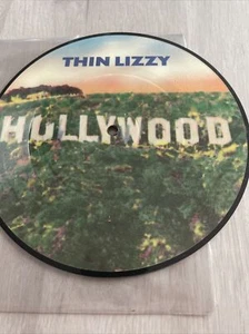 THIN LIZZY - HOLLYWOOD 7" VINYL PICTURE DISC 1981 WITH THE PRESSURE WILL BLOW UK - Picture 1 of 2