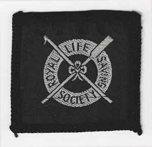 SCOUTS OF BRITISH / UK ROYAL LIFE SAVING SOCIETY (RLSS) DISTINTIVO EMBLEMA NERO - Foto 1 di 2