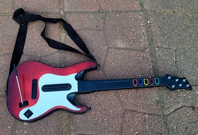 Guitarra inalámbrica Guitar Hero Band Hero 95893.805 roja/blanca para PS2/PS3 sin dongle  Foto 1 de 3