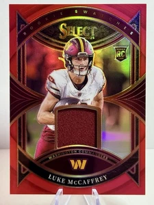 2024 Panini Select - Rookie Swatches Luke McCaffrey #RS-LMY Red Prizm (RC) - Picture 1 of 2