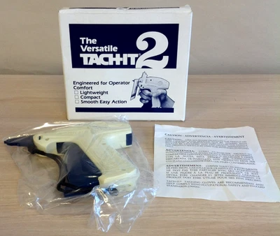 Herramienta de pistola de etiquetado premium estándar Tach-It 2 genuina TI2S empuñadura de pistola bronceada en caja Foto 1 de 4