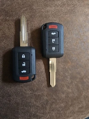 Lot of 24 sets of 2 Remote Head Key Fob Shells For '16-'17 Mitsubishi Lancer  - Image 1 of 4