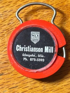 VINTAGE Wauzeka, Wisconsin  KEY CHAIN TAPE MEASURE CHRISTIANSON MILL MASTER FEED - Picture 1 of 4
