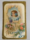 Greeting Postcard Happy Days c1913 Victorian Girl Blue Bows Dress Basket Flowers