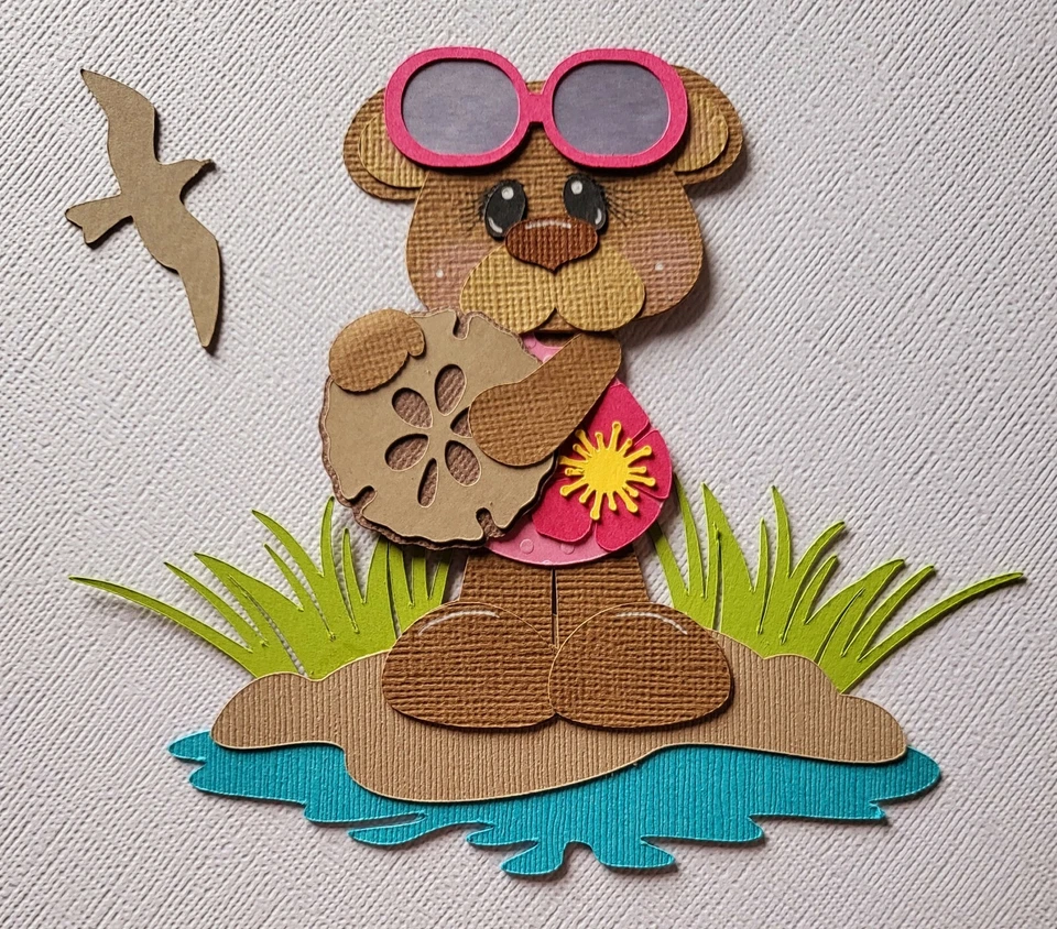 Oso de playa niña. Álbum de recortes, piezas de papel para hacer tarjetas Foto 1 de 1