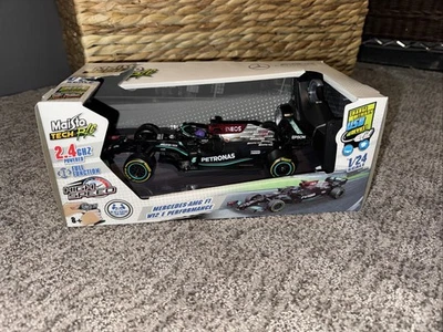 Nuevo con etiquetas Mercedes Benz AMG F1 W12 E Performance Lewis Hamilton #44 negro 1:24 Foto 1 de 4