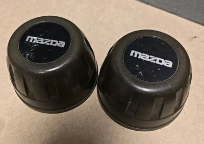 2 1991 - 1993 年马自达 323 原始设备制造商中心盖 #887137191 — 第 1/4 张图片