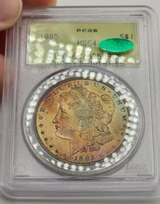 1885 Morgan Silver Dollar PCGS MS64 CAC OGH Rainbow Sunset Toned Textile Toning - Image 1 of 4
