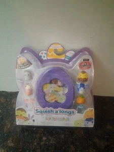 SQUISH-A-LONGS Squishmallows OSTERN MINI SQUISH 4er Pack lila Eierkoffer **LESEN** - Bild 1 von 2
