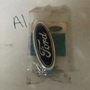 NOS Ford OEM E4TZ-9842528-A Oval Nameplate Emblem Rear Liftgate - Imagen 1 de 2