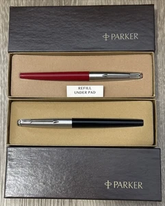 Due penne a sfera vintage Parker sfera galleggiante - nuove nere e rosse - Foto 1 di 3