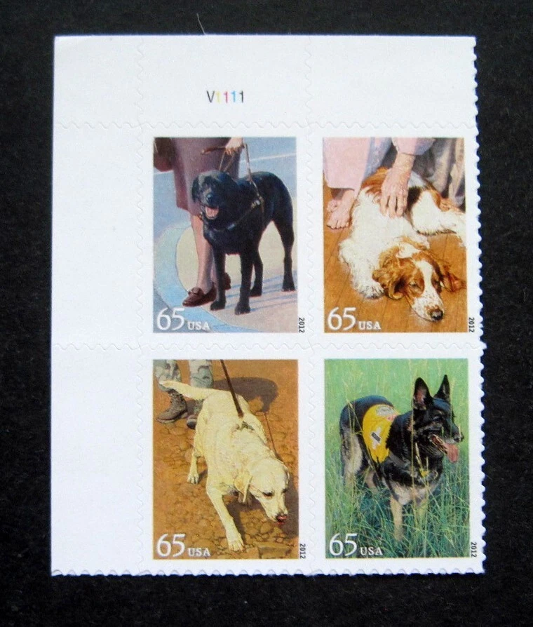 Sc # 4604-4607 ~ Plate # Block ~ 65 cent Dogs at Work Issue - Image 1 of 1