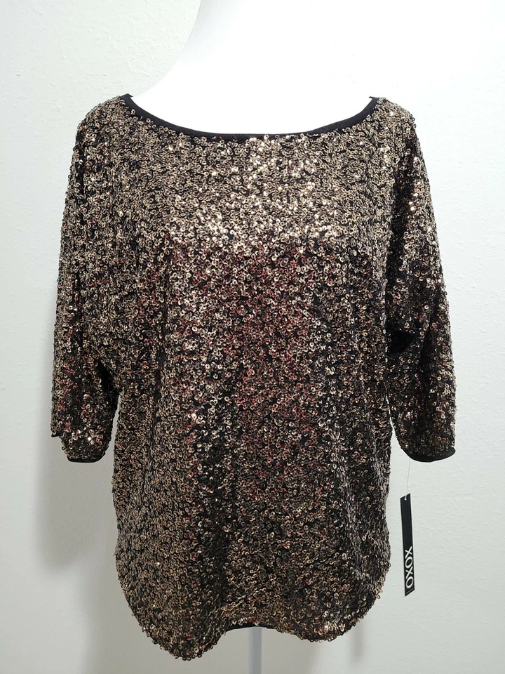全新带标签 XOXO 女式衬衫 3/4 Dolman 袖圆领亮片金色。M 码 — 第 1/4 张图片