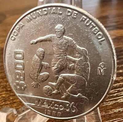 MEXICO 86 $200 PESOS MUNDIAL FUTBOL 1 COIN 1986 COLLECTIBLE - Image 1 of 3