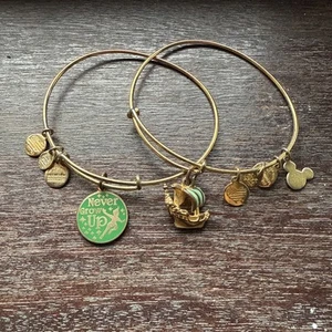 Disney Parks Authentic Alex Ani Bracelet Set Peter Pan Never Grow Up Gold Tone - Picture 1 of 5