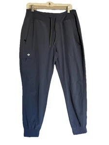 Damen L Metro Street Jogginghose grau Knöcheltaschen Training Athleisure Laufen - Bild 1 von 9