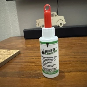 Mighty MENDIT Permanent Fabric Adhesive, Flexible Stretchable Washable Clear 2oz - Picture 1 of 2