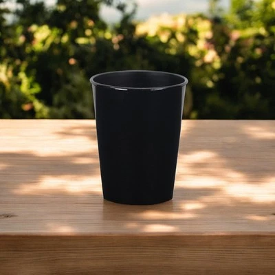 Maceta redonda de plástico reciclado negro de 5" para interiores y exteriores Foto 1 de 4