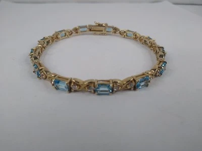 Brazalete de plata de ley 925 oro vermeil topacio azul claro 7,75" Foto 1 de 4
