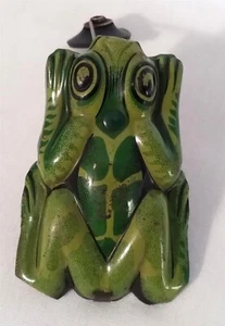 Juguete de hojalata vintage rana saltadora ventosa acción de resorte Adams - Imagen 1 de 6