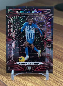 Simon Adingra 2023 2023-24 Panini Obsidian Soccer #27 Rookie RC Red Pulsar /49 - Bild 1 von 2