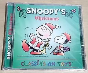 PEANUTS Snoopy’s Christmas Classiks On Toys - Holiday CD - NEW SEALED 1994 - Foto 1 di 6