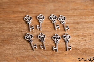8 x Small Fairy Key Charm Silver Metal Charms Jewellery Making Craft Double Side - Picture 1 of 6