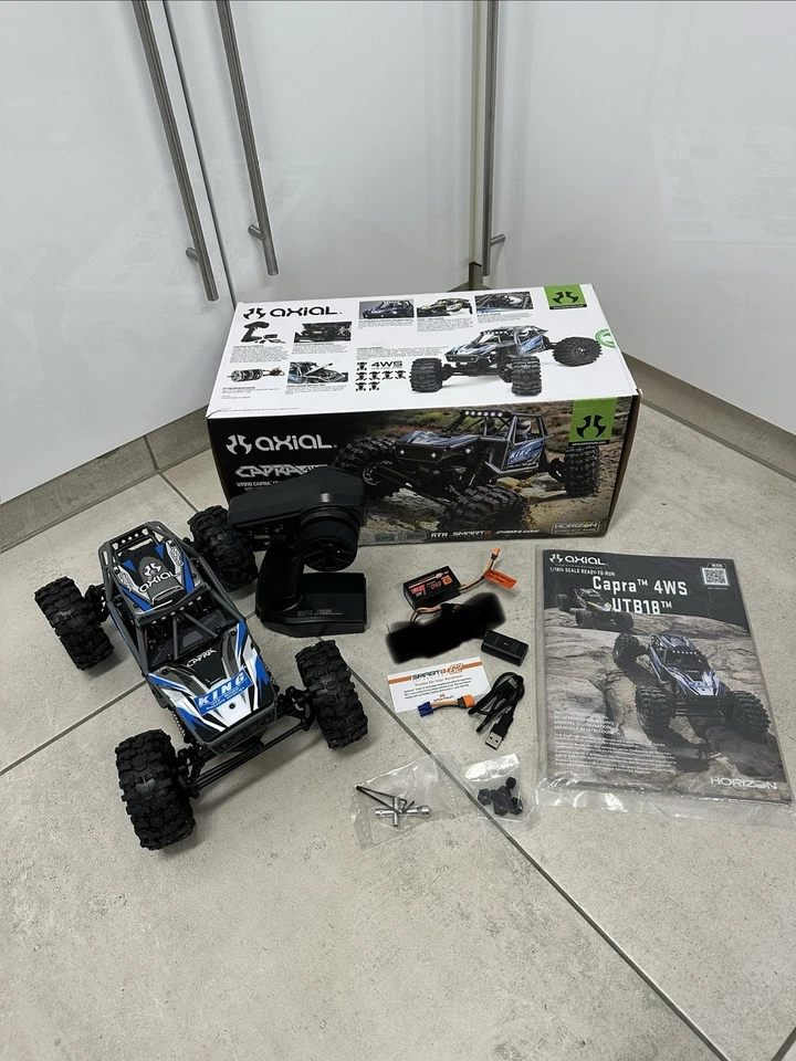 Axial AXI-1750T1 1:18 UTB18 Capra 4WS 4WD Trail Buggy RTR - blau - Bild 1 von 4