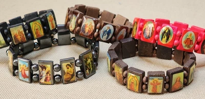 Lote de 5 brazaletes elásticos de hematita de madera religiosa cuadros santos Jesús ángeles Foto 1 de 4