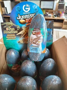 9 x Großhandel 3D Jurassic Ei Dinosaurier Puzzle Ei Spielzeug Spiele Tasche Füller CC - Bild 1 von 9