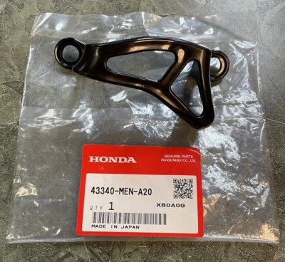Protector de pinza de freno trasero genuino OEM Honda CRF150 CRF250 CRF450 43340-MEN-A20 Foto 1 de 3