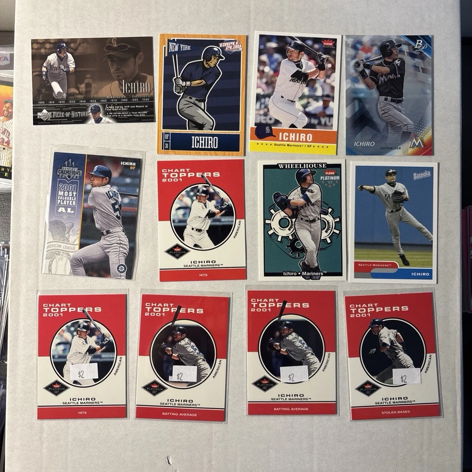 Lote de 12 cartas Ichiro Suzuki 5 2001 novato (RC) y 3 2002. Más 4 tarjetas de bonificación Foto 1 de 1