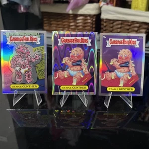 2024 Topps Chrome Garbage Pail Kids Staple Gunther #R-292a/292a Drool/Refractor - Bild 1 von 8