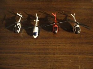 The vintage lot of 4 matchbox ,diecast helicopter (Police & Fire Dept. )used - Picture 1 of 5