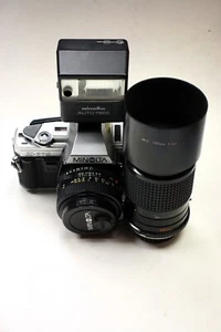 Minolta X-370 35mm SLR Film Camera with Auto 118X Flash, 50mm 1.7, and 135mm 3.5 - Picture 1 of 14