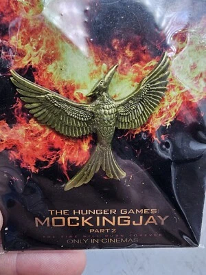 The Hunger Games Part 2 Gold Mockingjay Pin Back Hat Lapel  2015 Wings Bird - Image 1 of 3