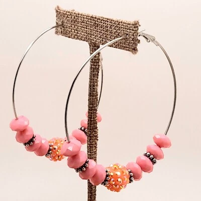 Pendientes grandes finos coloridos aro plástico rosa y cuentas brillantes estilo moda Foto 1 de 4