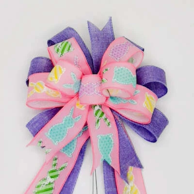 Arco de Pascua morado y rosa con estampado de conejito Foto 1 de 2