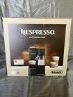 Nespresso Pixie Kaffeemaschine mit Aeroccino3 Milchaufschäumer offene Box