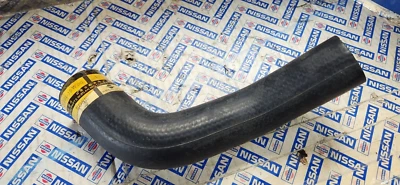 Manguera de radiador superior moldeada DATSUN 83-86 720 NOS 21501-19W00 Foto 1 de 2