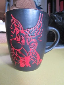 2009 Parc Asterix Silhouette Style Mug featuring Asterix The Gaul - Picture 1 of 4