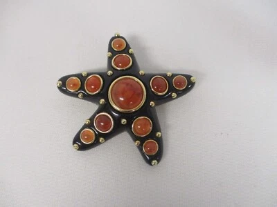 SIGNED KJL KENNETH JAY LANE BLACK STARFISH w AMBER CABOCHON BROOCH - Image 1 of 4
