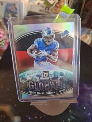2021 Panini Donruss Optic - Globall Amon-Ra St. Brown #GB-3 (RC) - Image 1 of 2