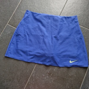 NIKE Sportrock Tennisrock blau Gr. XS/S (S steht drin) mit Innenhose - Bild 1 von 6