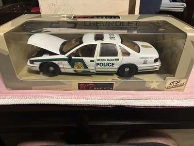 UT Models 1996 Chevrolet Caprice Metro Dade Florida Police 1/18 Diecast Car - Image 1 of 3