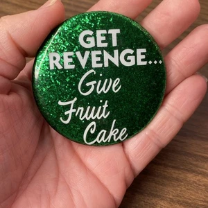 VTG Get Revenge Give Fruit cake 2” Button Novelty Holiday Humor Russ Co USA Made - Picture 1 of 8