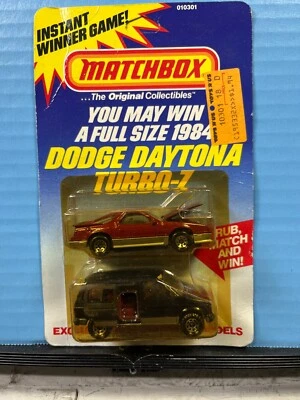 1/64 MATCHBOX 84 CHRYSTLER MODELS SET DODGE DAYTONA TURBO-Z & CARAVAN RED/BLACK - Image 1 of 2