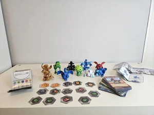 10x Bakugan Battle Brawlers Spin Master mit 51x Karten und 14x Bakucore Konvolut - Bild 1 von 8